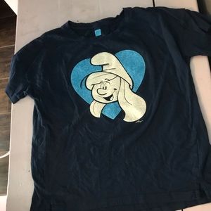 A navy blue shirt with smurf on the front